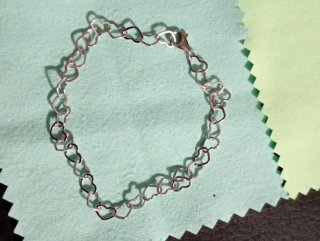 Pulsera eslabones corazones plata