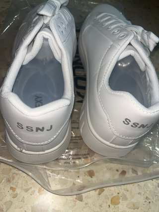 Zapatos blancos de hombre