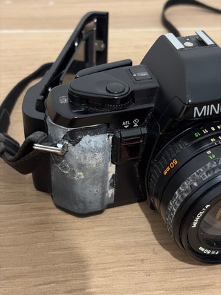 Cámara Minolta X-300s + 3 objetivos y accesorios
