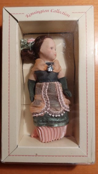 Muñeca de porcelana Kensington Collection