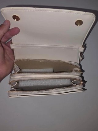 Bolso YSL blanco con logo dorado