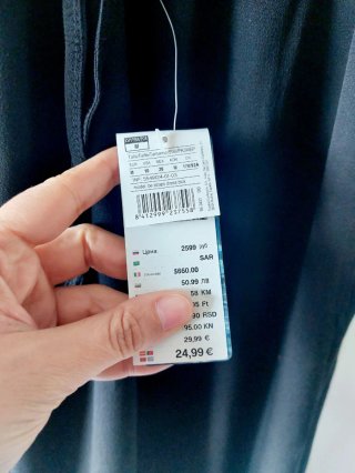 Vestido negro tirantes cruzados escote