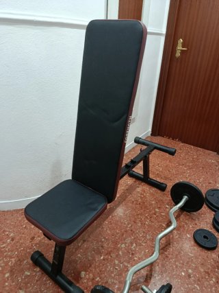 Banco musculación + Barra y Mancuernas