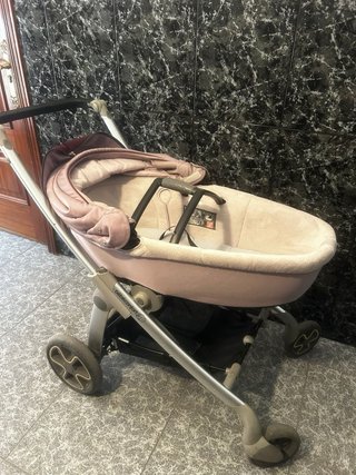 Coche de bebé niña con accesorios