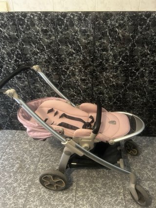 Coche de bebé niña con accesorios