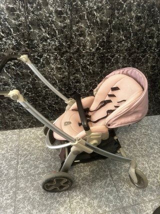 Coche de bebé niña con accesorios