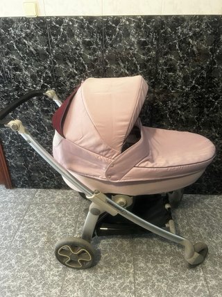 Coche de bebé niña con accesorios
