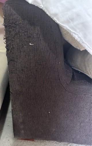 Sofá de tela beige y marrón