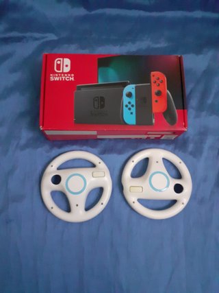 Consola Wii Mini + Mando + 2 Volantes + 4 Juegos