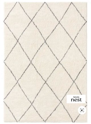 Alfombra gris y blanca