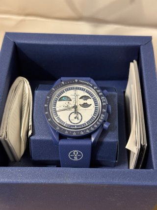 Omega xSwatch Mission to Earthphase Moonshine Gold