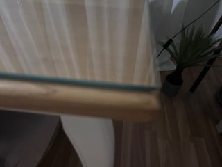 Mesa de comedor de cristal y madera
