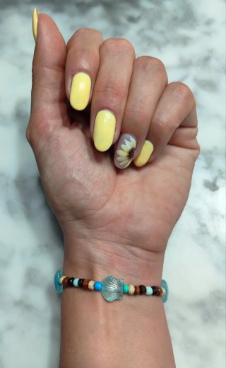 Pulsera artesanal conchas y madera