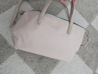 Bolso beige con osito azul