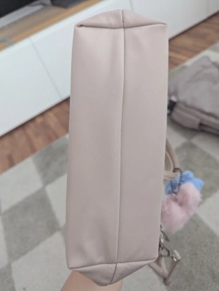 Bolso beige con osito azul