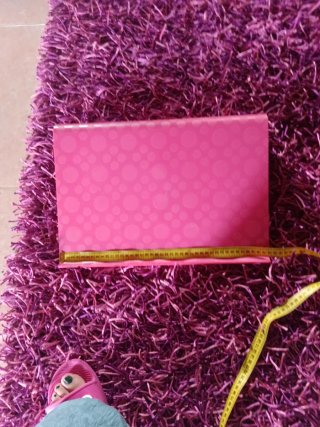 Reposapiés rosa con círculos