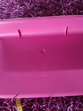 Reposapiés rosa con círculos