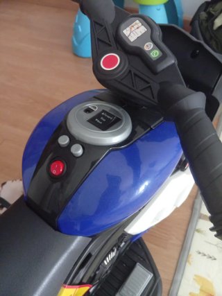 Moto electrica  infantil azul y blanca