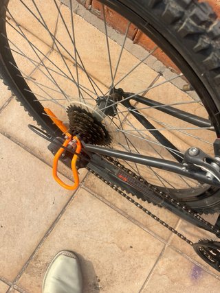 Bicicleta BTT Rockrider Negra y Naranja