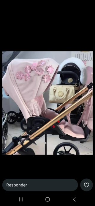 Cochecito de bebé Garreton rosa con flores