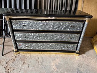 Mesa de lujo negra y dorada