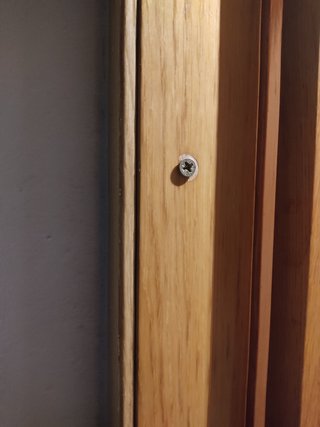 Puerta de madera con cristal