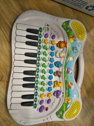 Piano infantil con animales y luces
