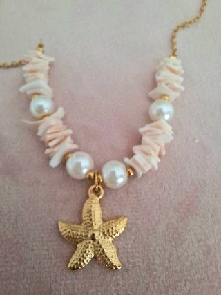 Collar de conchas marinas y perlas con estrella
