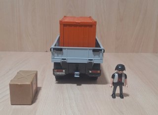 Camión Playmobil con figura y caja
