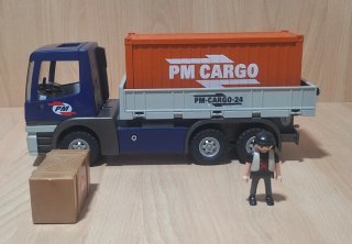Camión Playmobil con figura y caja