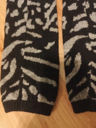 Calentadores leopardo negro y gris
