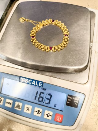 Pulsera Oro 18kt piedras rojas y colgante corazón