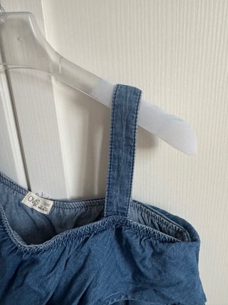 Tuta corta in denim con volant