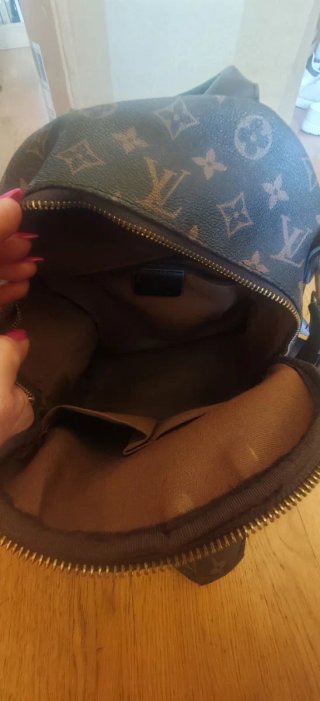 Mochila Louis Vuitton Marrón y Dorada