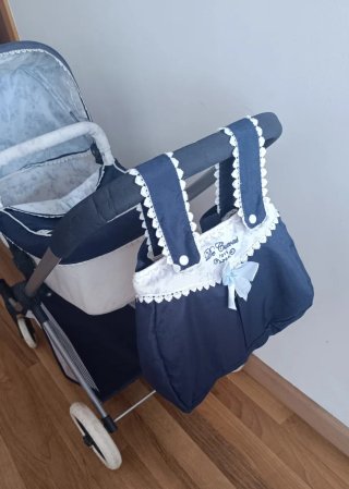 Carrito de bebé de juguete
