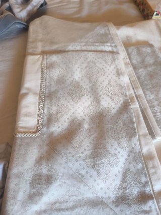 Juego de sábanas beige