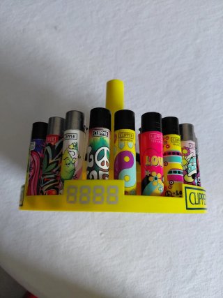 24 accendini Clipper da collezione più contenitore