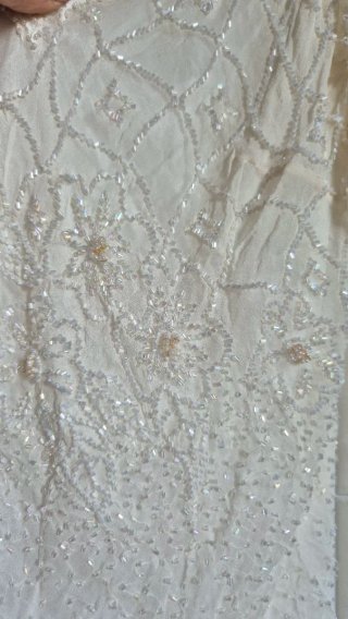Top bianco con perline
