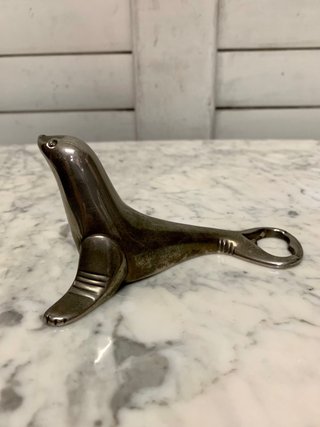 Abridor de botellas vintage de foca