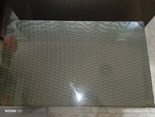 Sofá y mesa de terraza con cristal