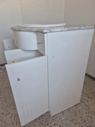Mueble de baño con lavabo de mármol