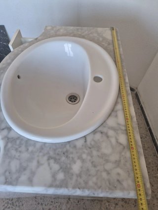 Mueble de baño con lavabo de mármol