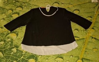 42/44, Precchio, blusa negra y blanca