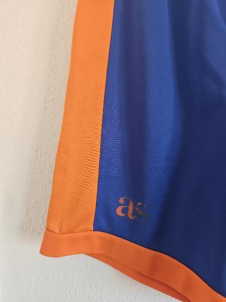Pantalón corto baloncesto azul y naranja