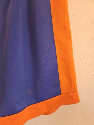 Pantalón corto baloncesto azul y naranja