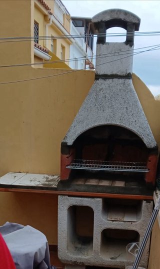 Barbacoa de obra con chimenea