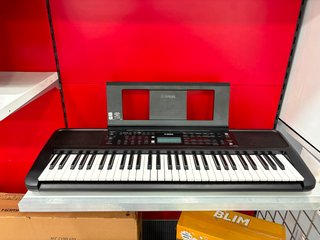 Teclado Yamaha con transformador