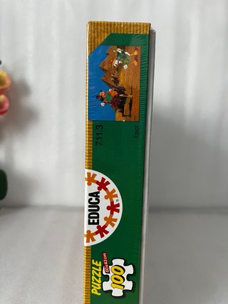 Puzzle Mickey Mouse World Tour 100 piezas