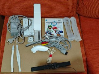 Nintendo Wii con Mario Kart y 2 mandos