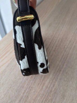 Bolso estampado vaca prada
